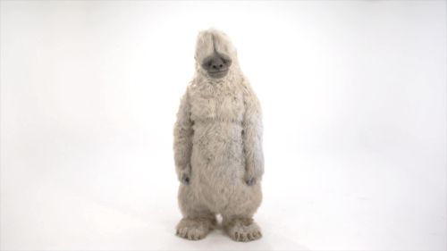 Large white yeti creature standing against a plain white background.